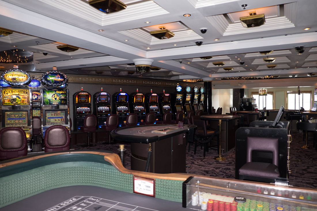Slots and tables in casino on Crystal Cruises