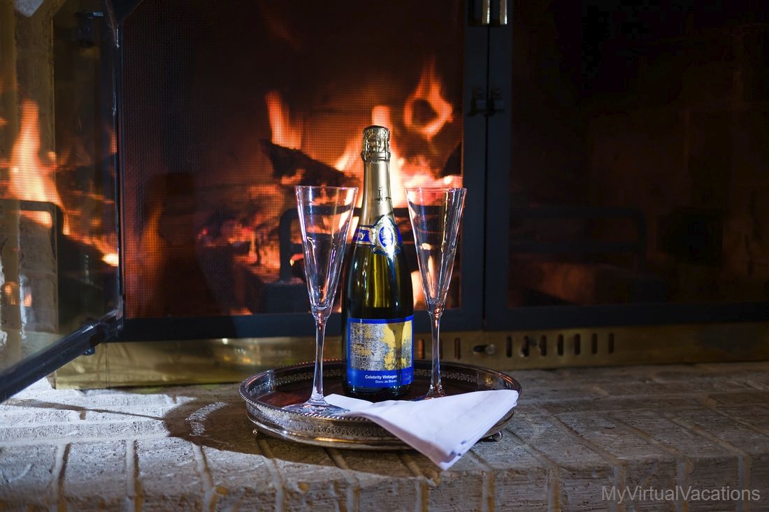 Romantic Sparking Wine by Fireplace